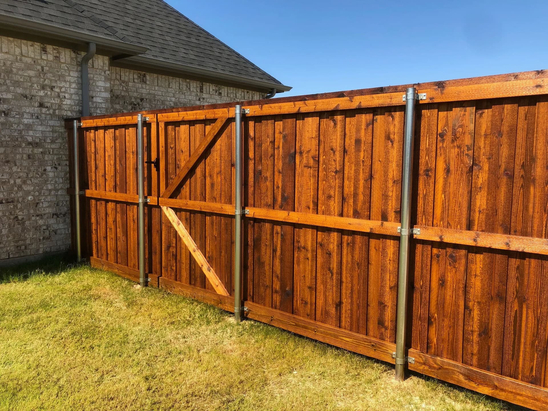 Revitalize Your Fence with Stunning Staining image